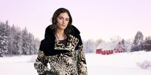 Animal Print Dyed Lamb coat in a beautiful winter landscape